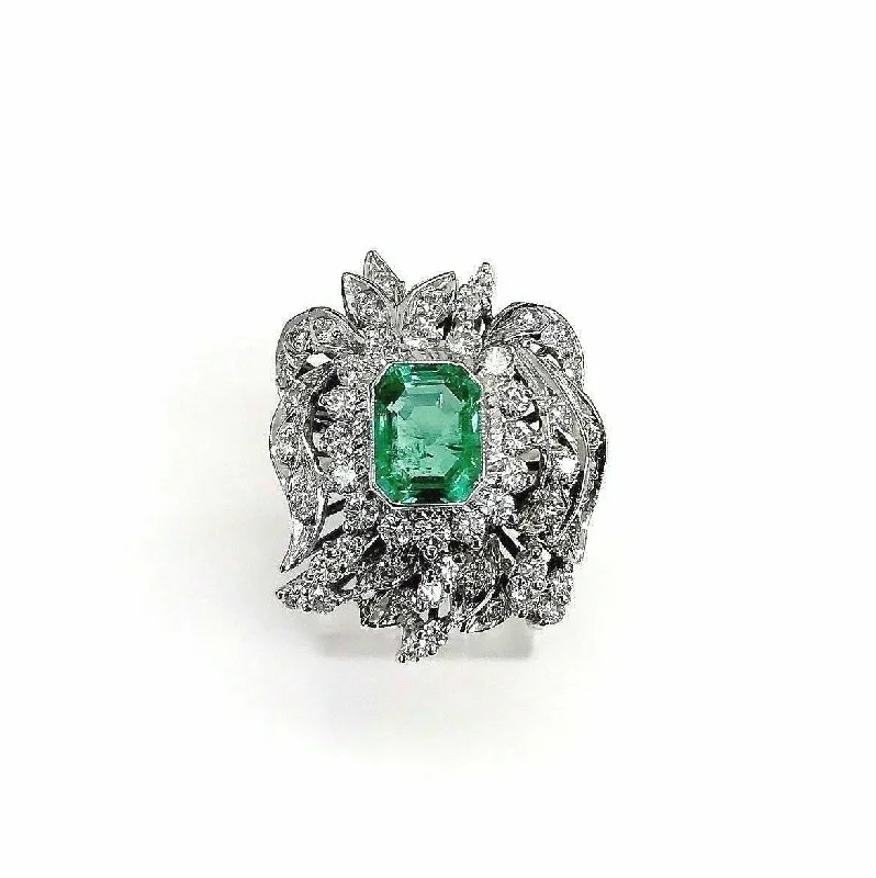 heart-shaped gold ring -2.88 Carats t.w. Diamond and Emerald Ring Emerald is 1.63 Carats Vintage 1980's