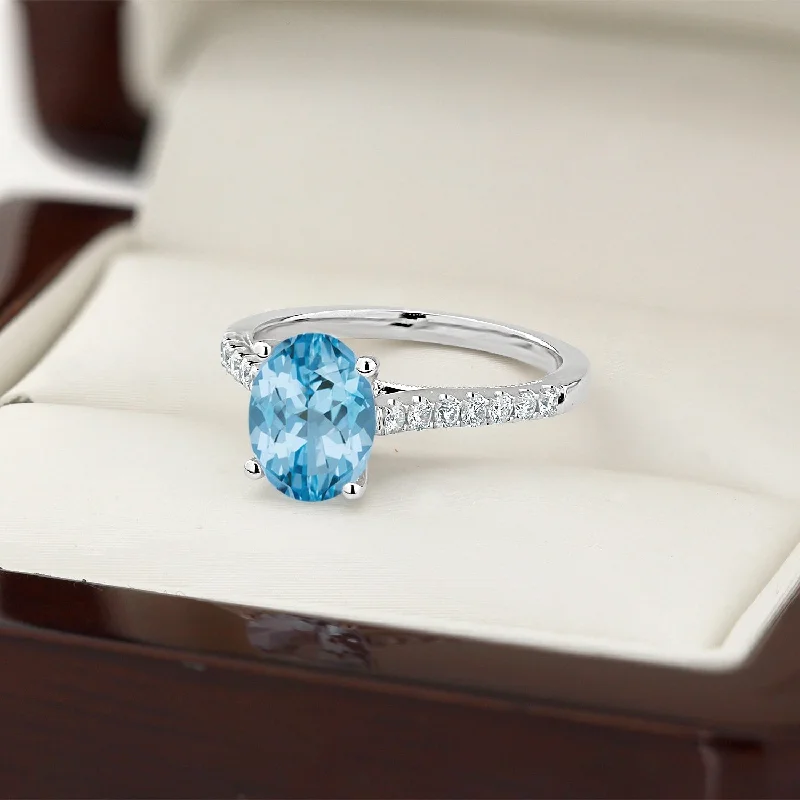 custom moonstone ring -Auriya 1 1/2ct Fancy Oval Sky Blue Topaz and Diamond Engagement Ring 1/4ctw 14k Gold