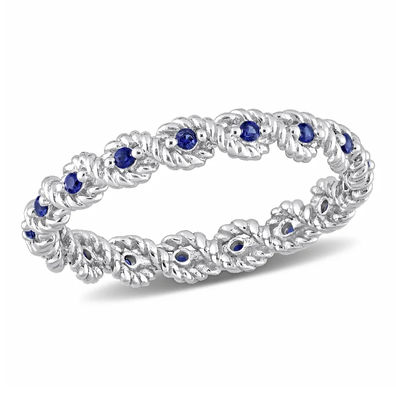 vintage-inspired gemstone ring -Miadora 1/6ct TGW Created Blue Sapphire Infinity Eternity Ring in 10k White Gold